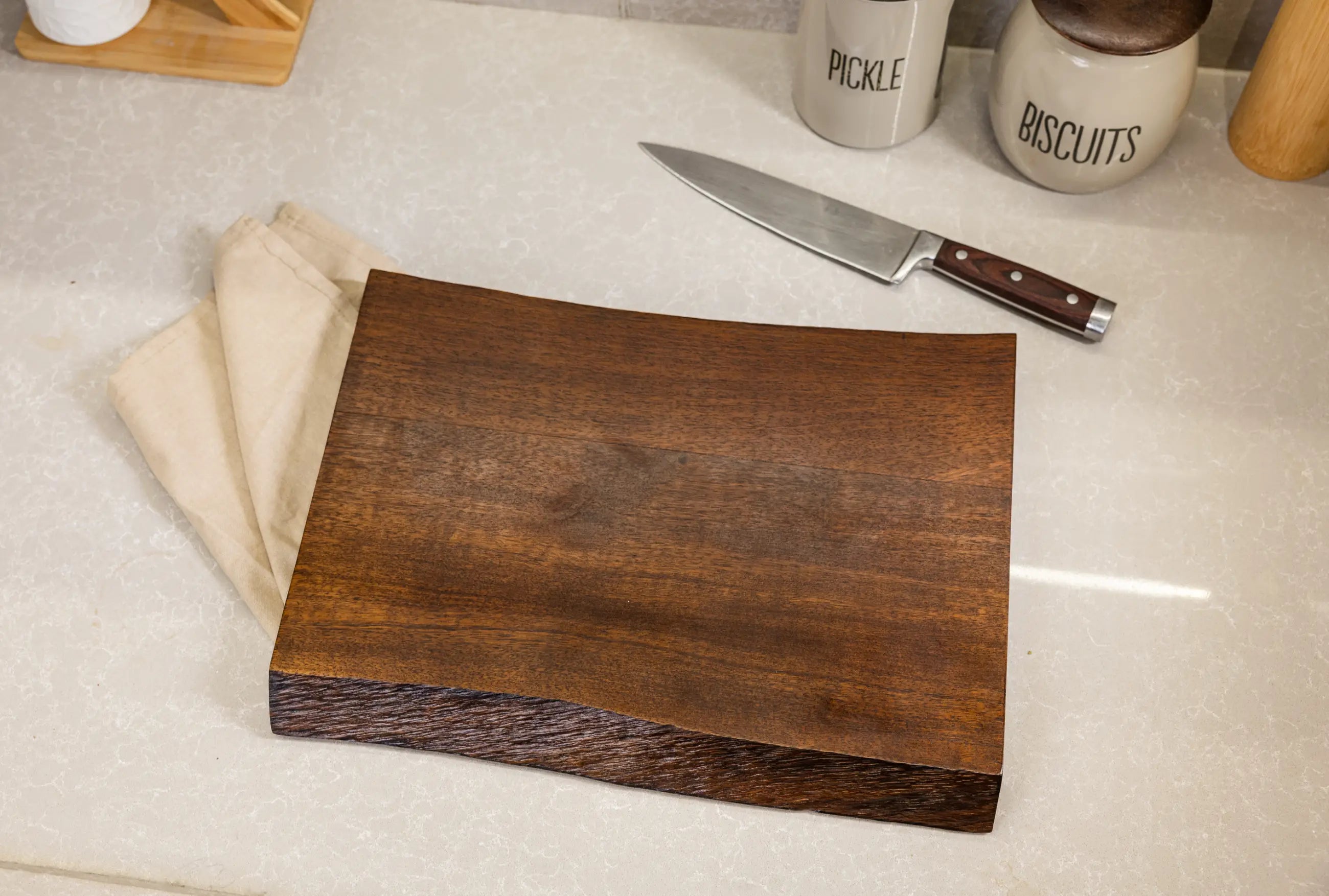 Handcrafted live edge wood cutting board with natural grain