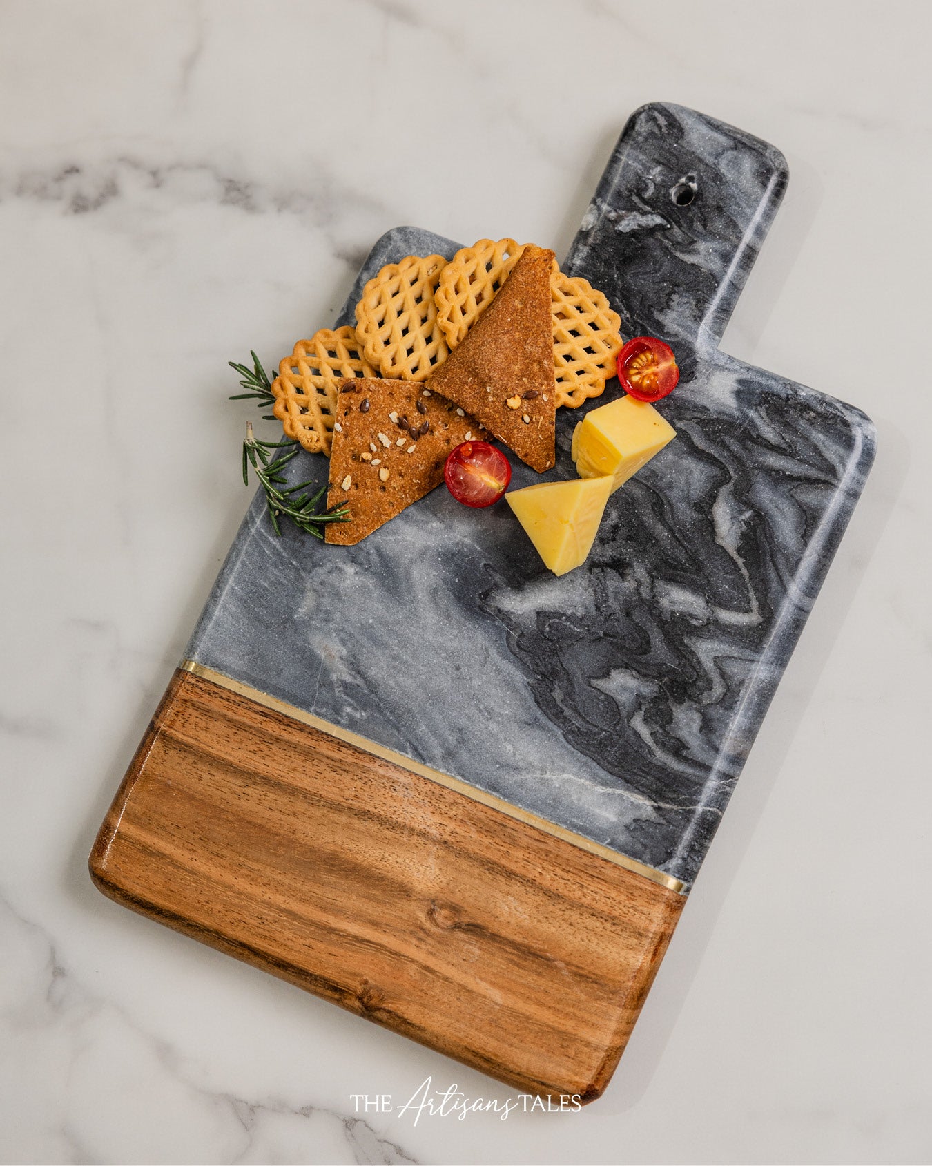 Marble and wood cutting board with snacks