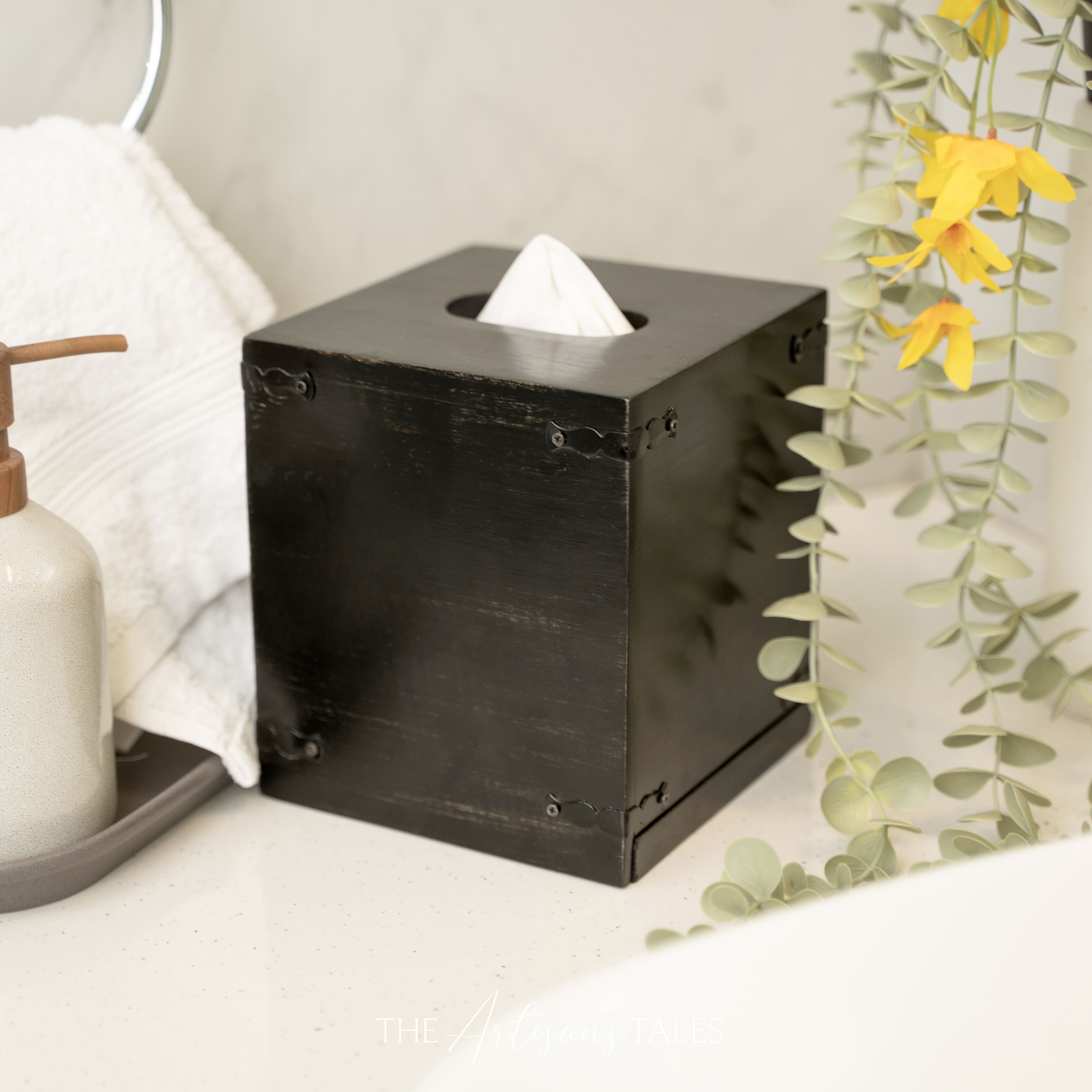black wooden box with tissue