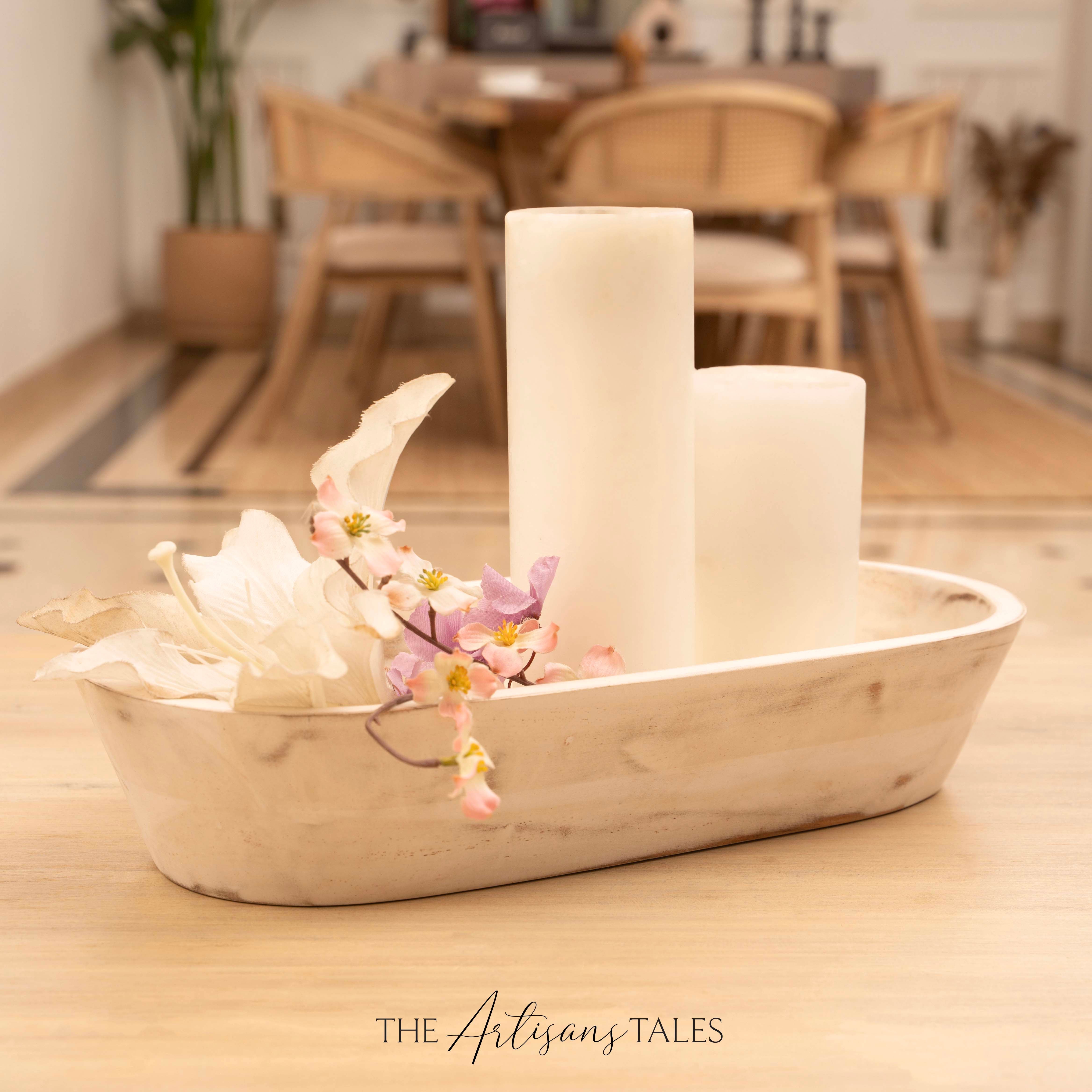 Decorative bowl with candles and flowers