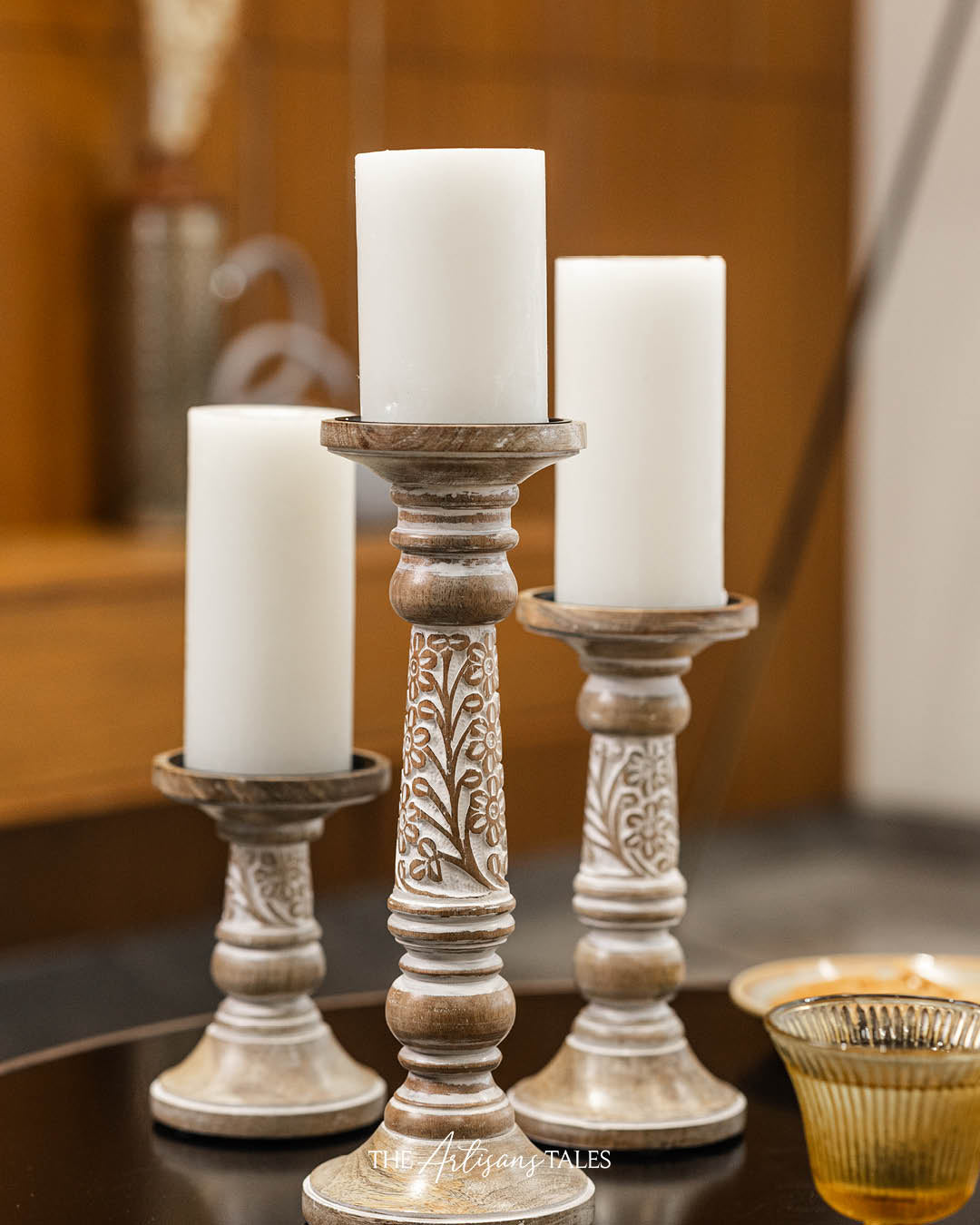 white carved wood candle holders