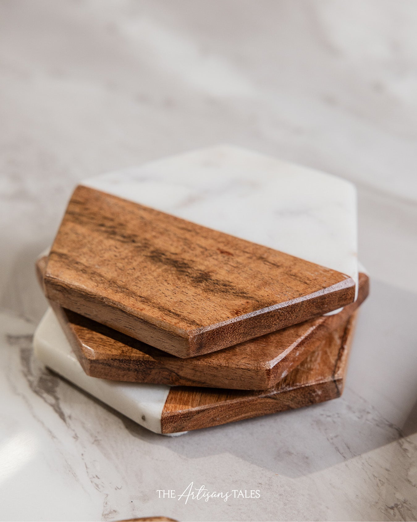 Stack of wooden coasters with marble