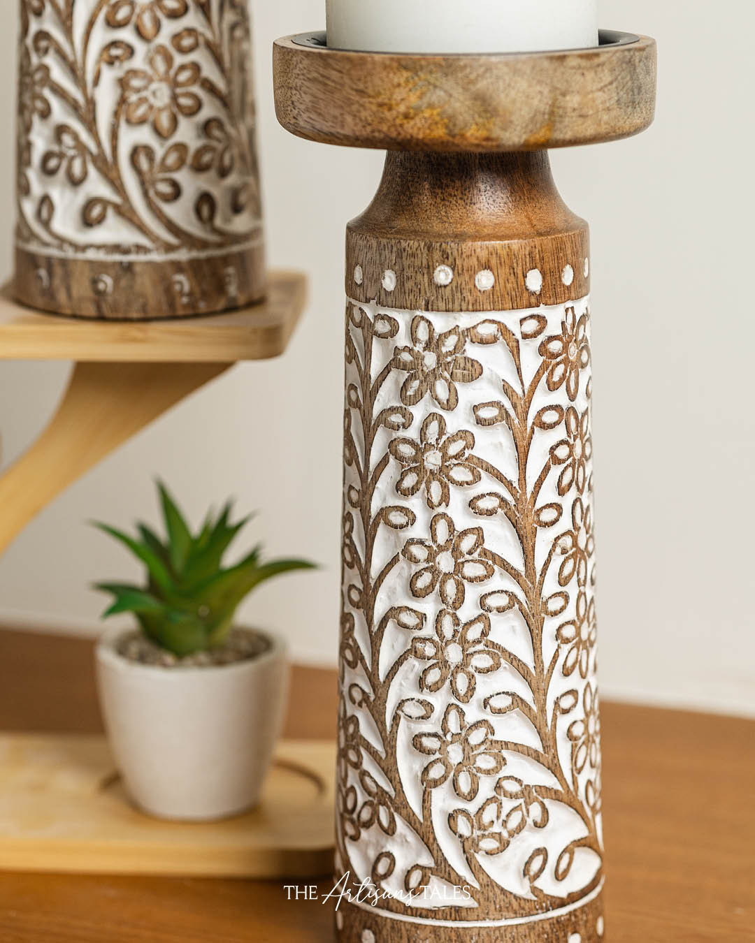 carved wooden candle holder